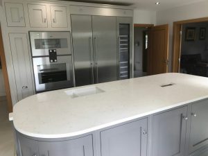 attica white carrera white quartz in kitchen with island